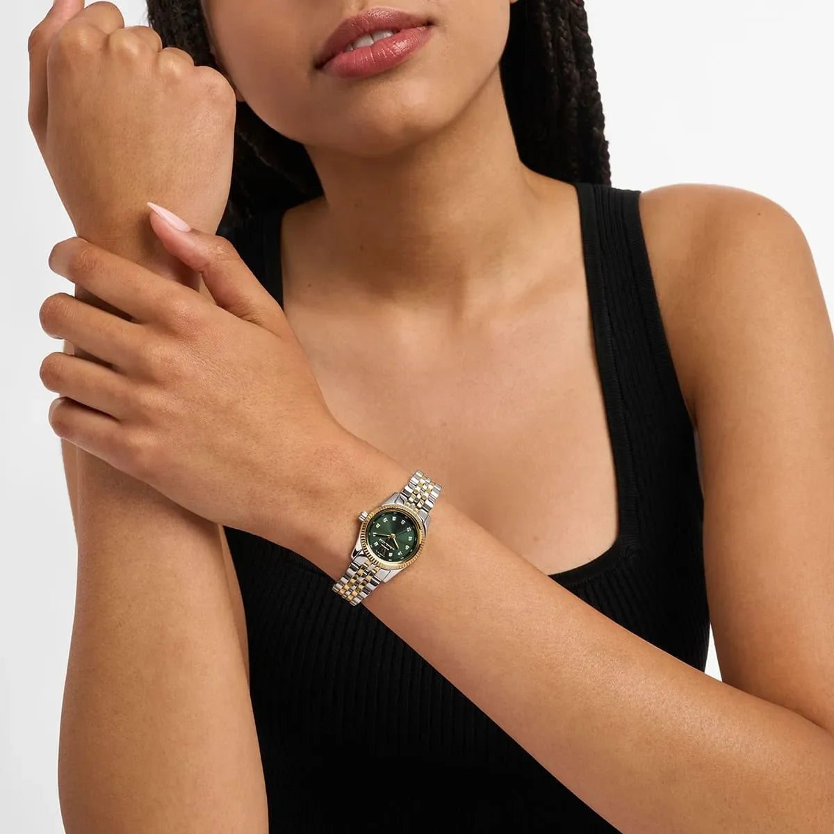 Michael Kors MK4986 women's watch worn on wrist showing green dial and two-tone bracelet