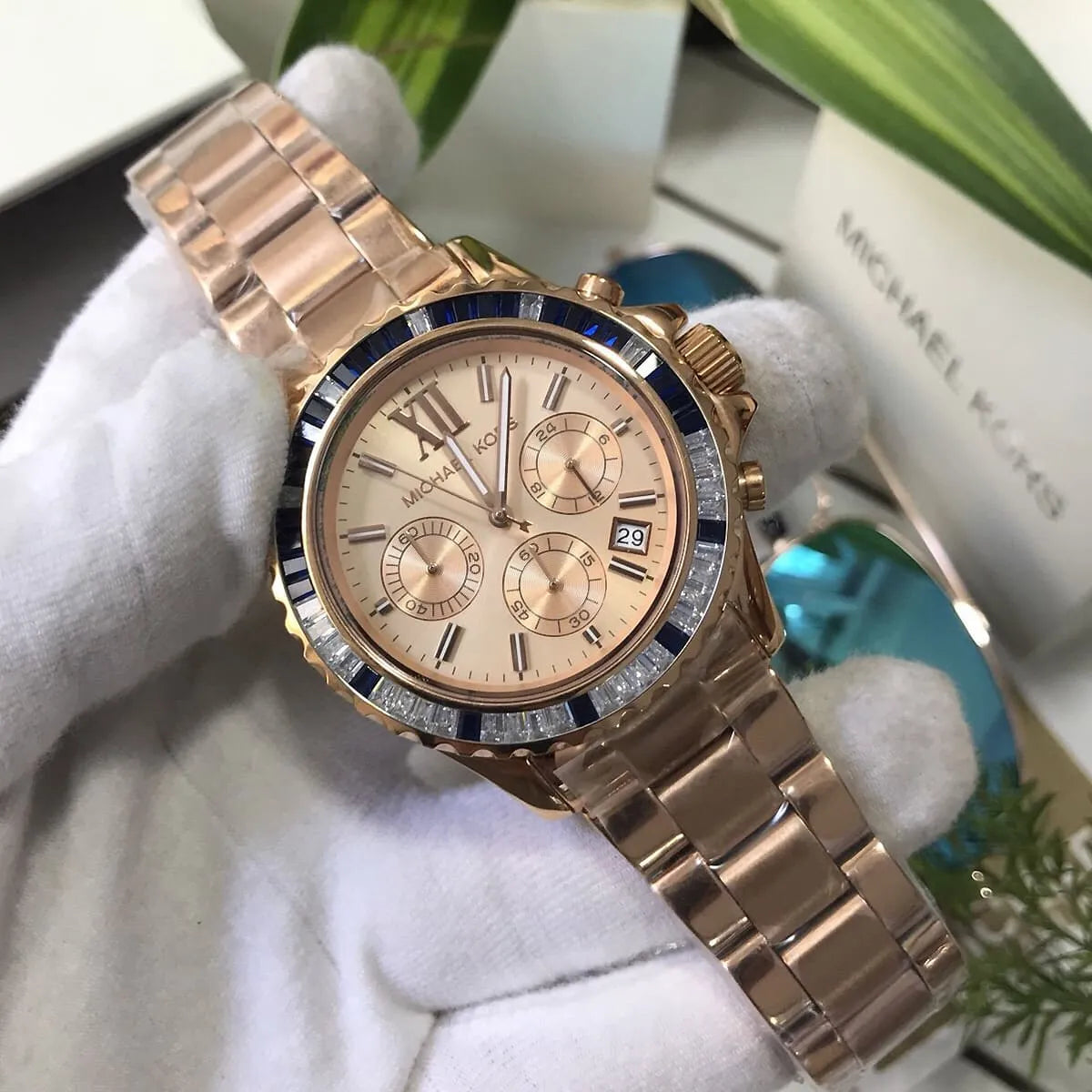 MK5755 Everest women's chronograph watch on wrist with rose gold case and bracelet