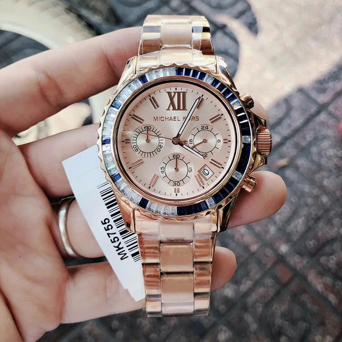Michael Kors MK5755 Everest rose gold chronograph watch on wrist with product tag