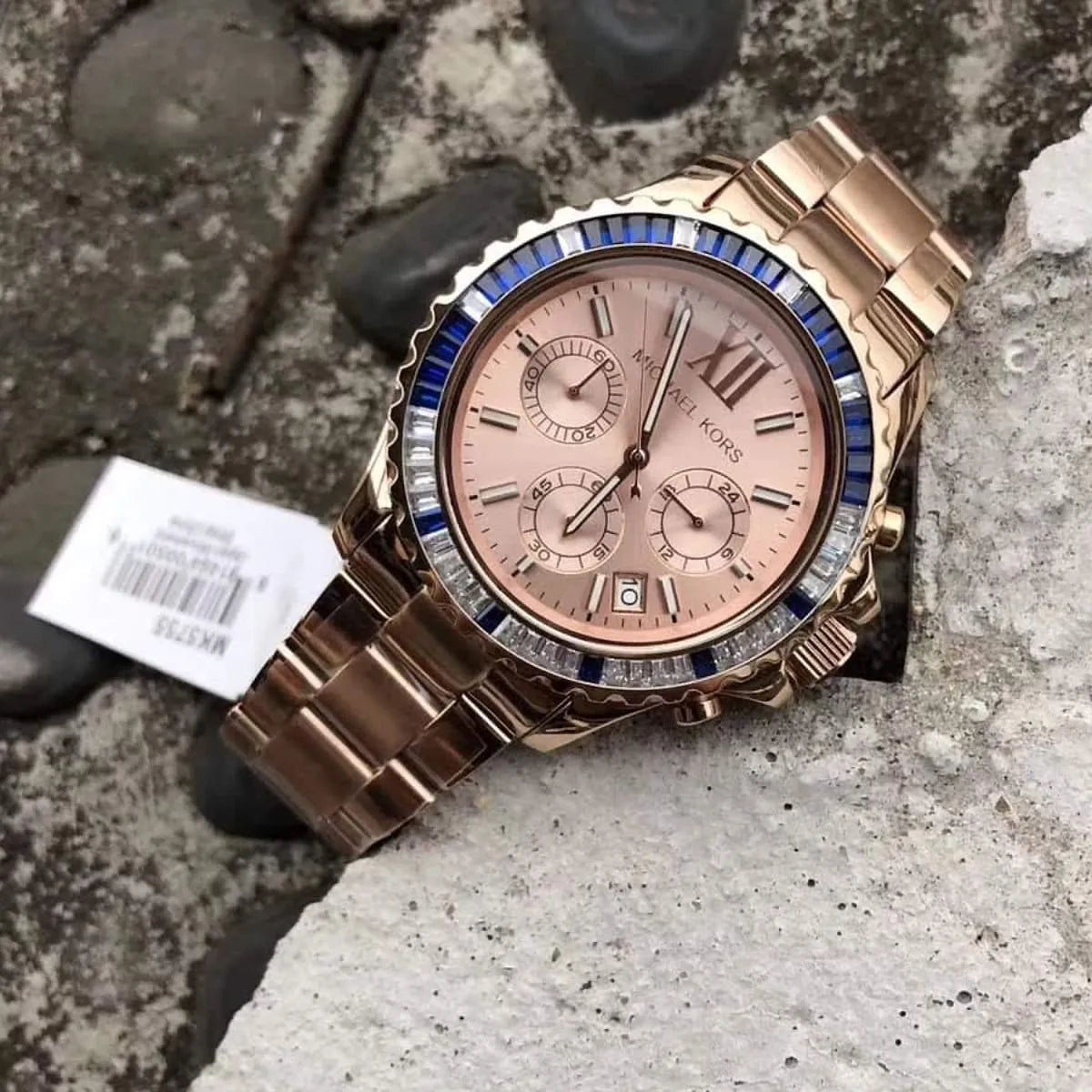 MK5755 Everest rose gold chronograph on surface showing full watch with bracelet
