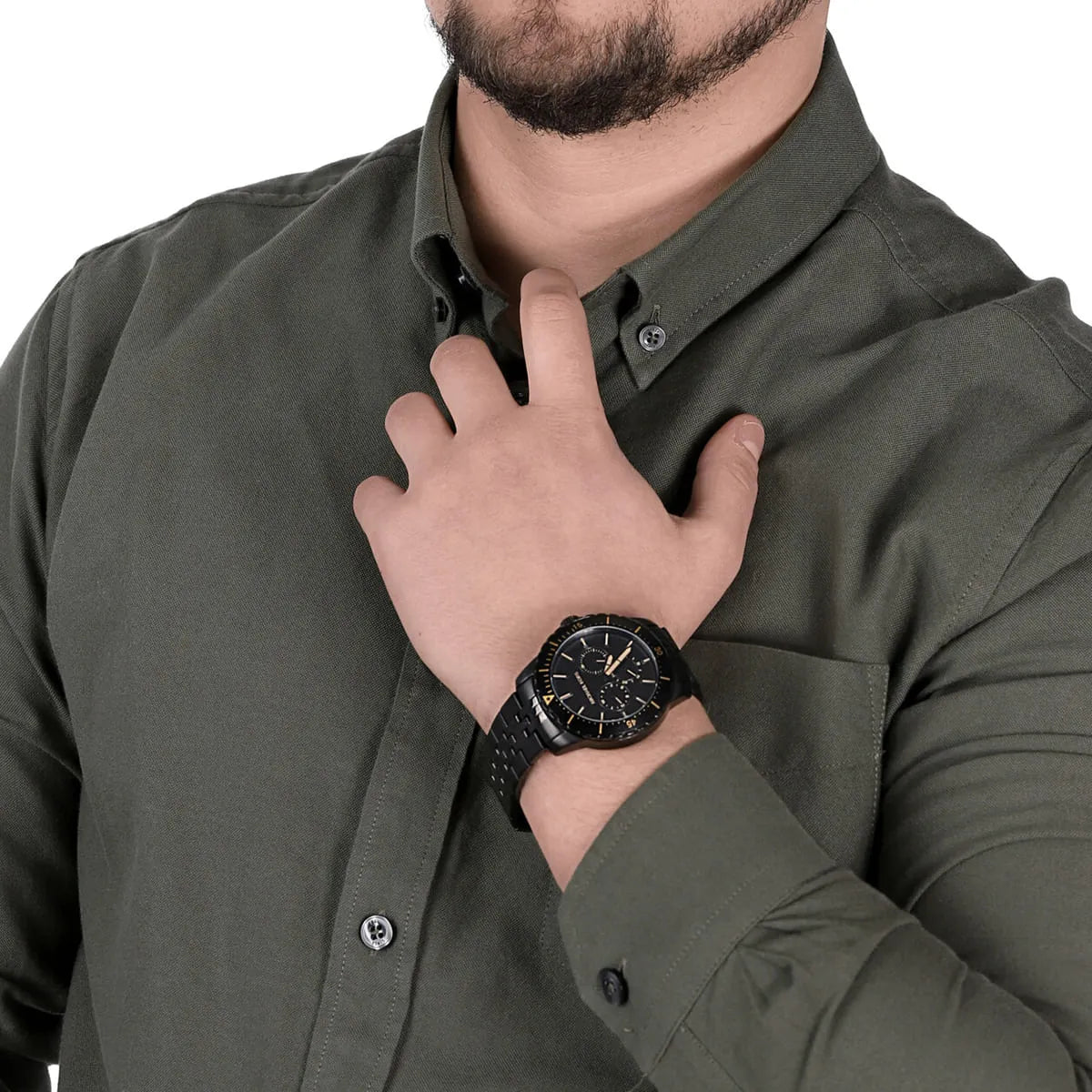 Michael Kors Cunningham MK7157 watch worn on men's wrist showing black dial and chronograph function