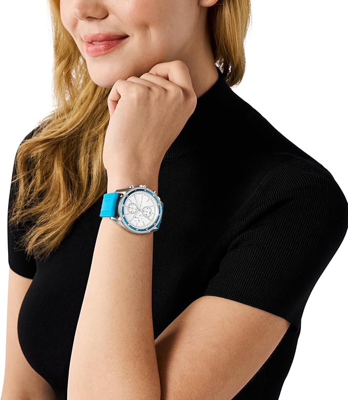 Michael Kors Hadyn women's watch worn on wrist with blue strap