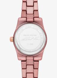Michael Kors Petite Lexington caseback showing brand engraving and transparent crystal