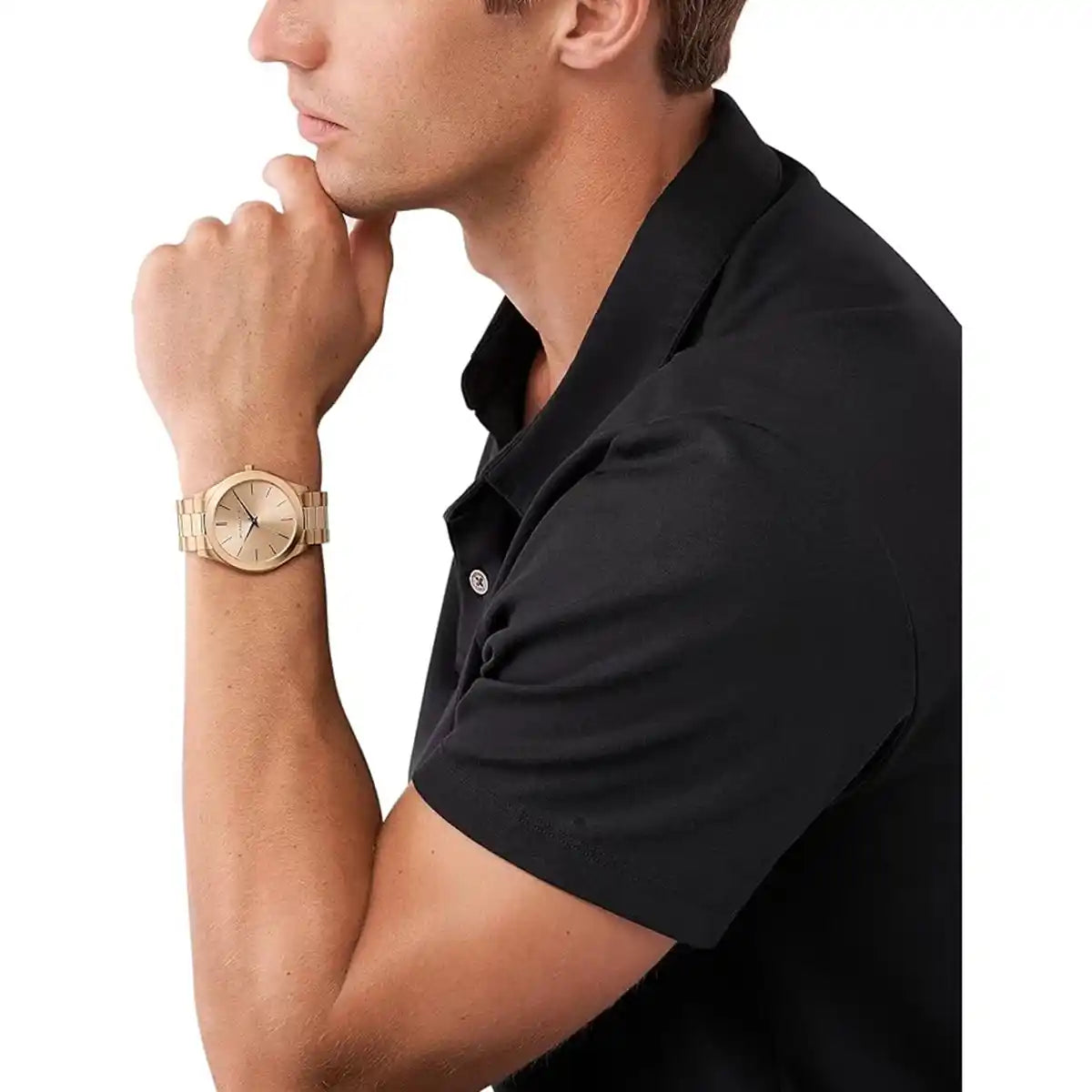 Michael Kors MK9122 gold-tone watch worn on wrist with beige dial visible