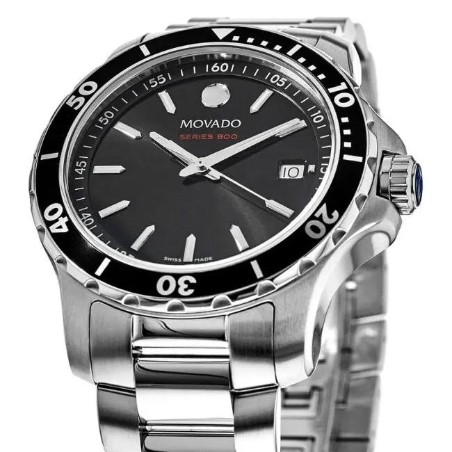 Movado men's watch showing stainless steel bracelet, case side and crown detail