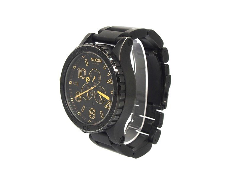 Nixon 42-20 Chrono angled view showing case, dial, and black stainless steel bracelet