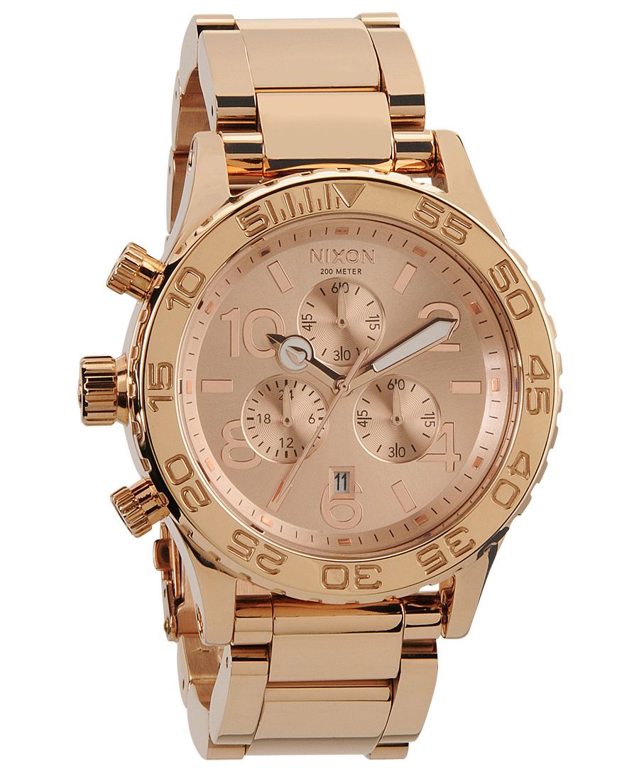 Nixon 42-20 chronograph watch with rose gold-tone case, rose dial, and chronograph subdials