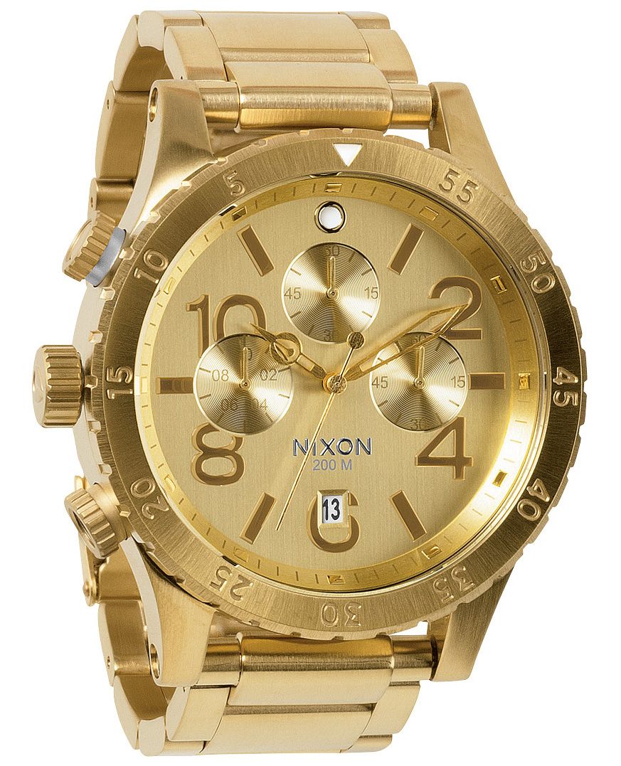 Nixon 48-20 Chrono gold-tone chronograph watch at three-quarter view showing dial detail