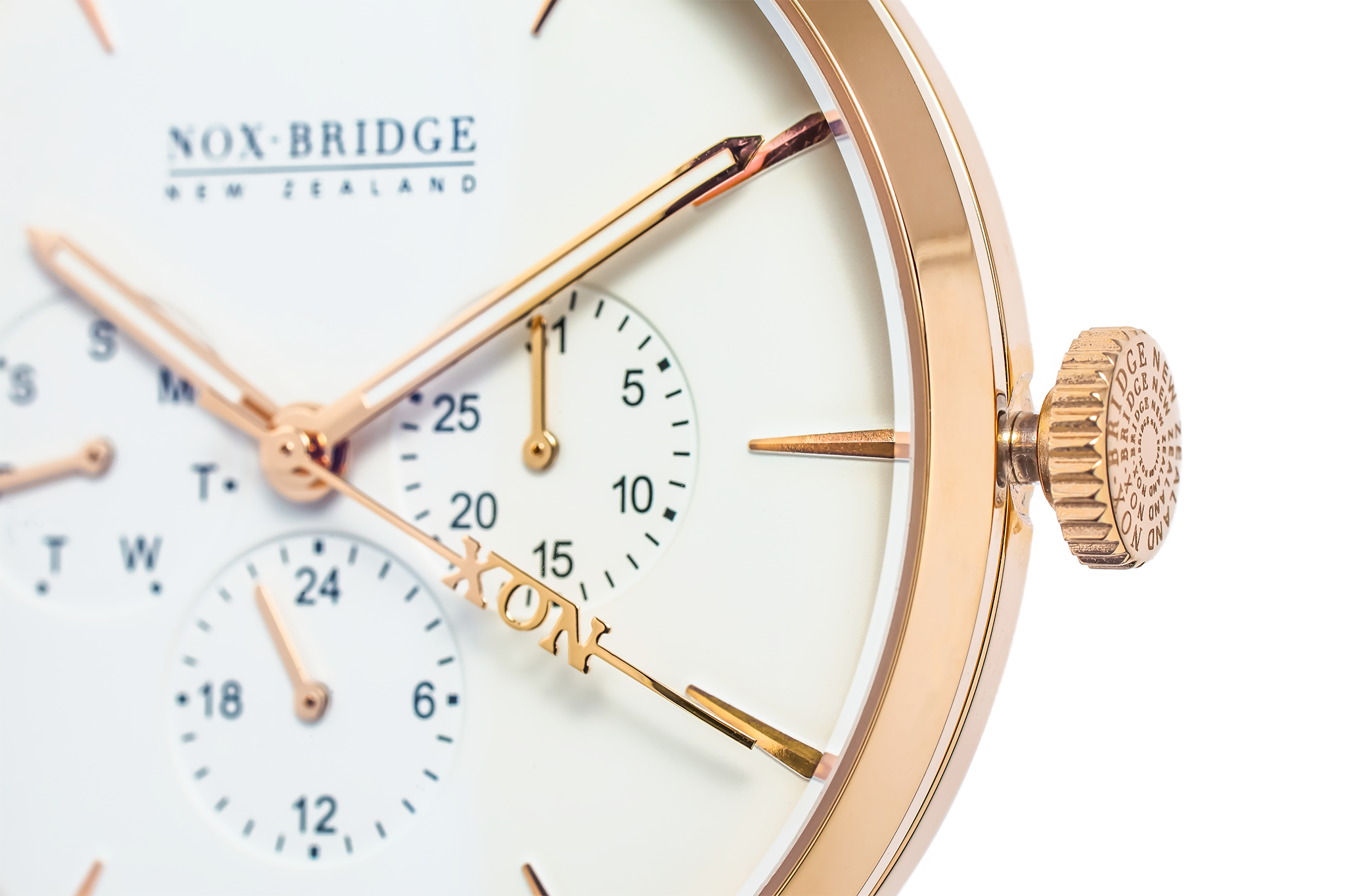 Close-up of Noxbridge Classic Izar dial showing chronograph subdials, rose gold case, and crown detail