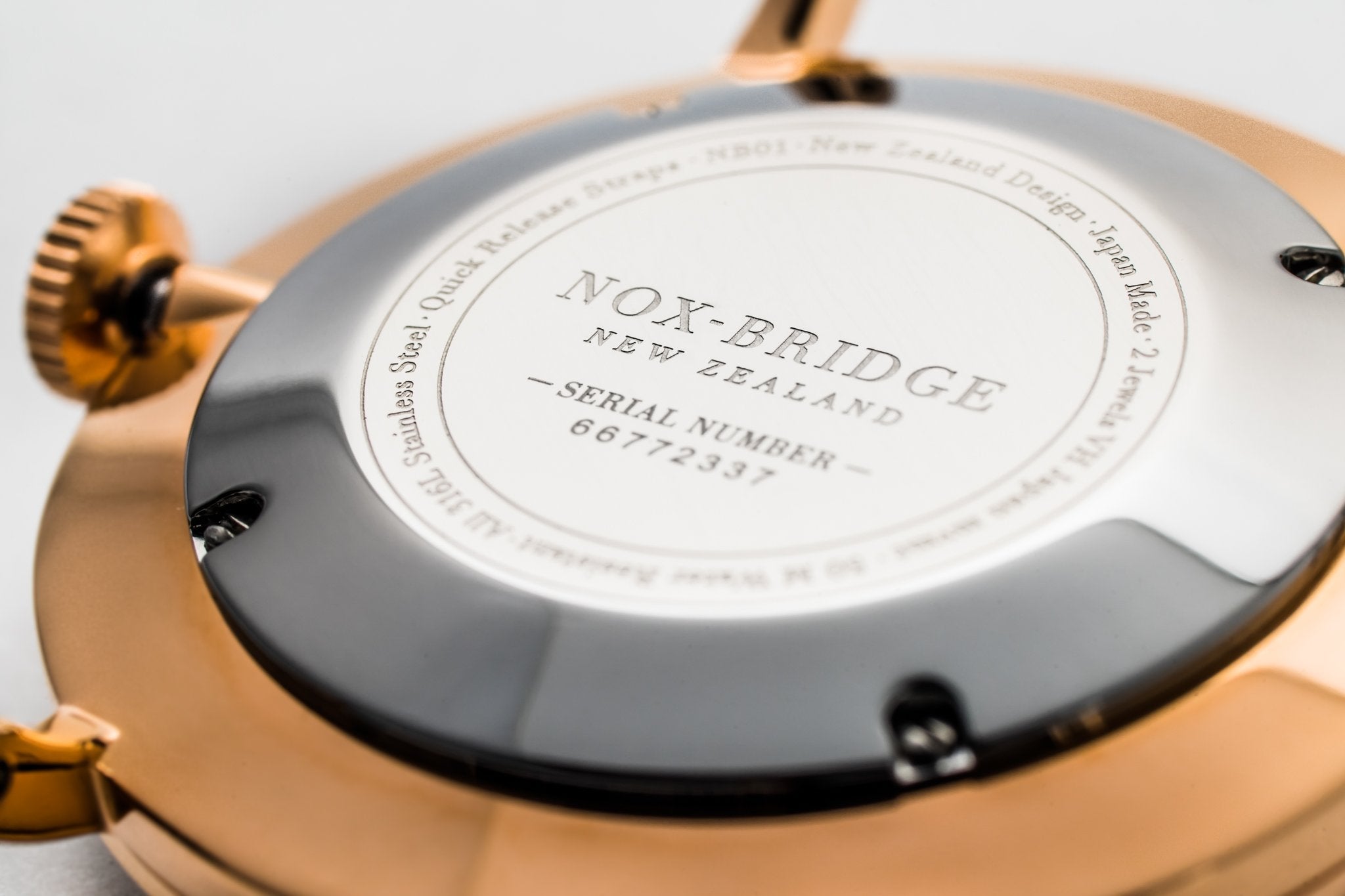 Noxbridge Classic Izar caseback showing engraved serial number and brand details on rose gold case