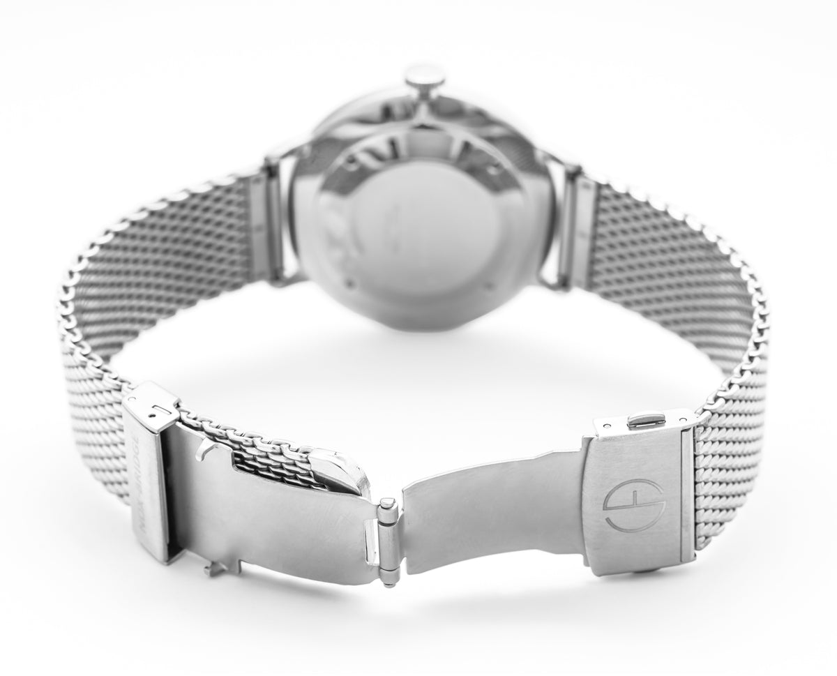 Noxbridge Pegasus mesh bracelet worn on wrist showing case and clasp detail