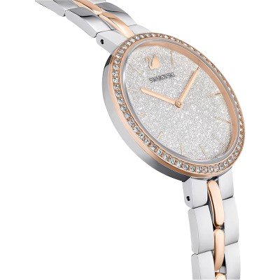 Angled view of Swarovski Attract watch showing rose gold and silver bicolor metal bracelet and crystal bezel