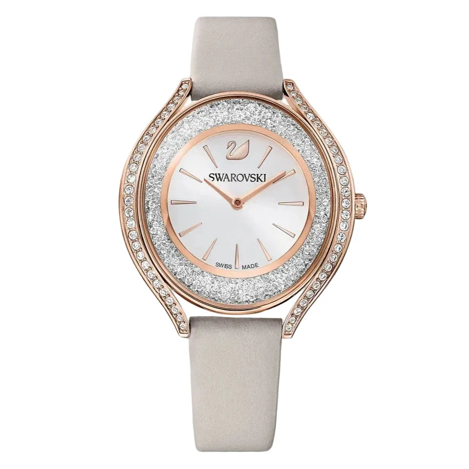 Swarovski Crystalline Aura rose gold tone women's watch with crystal oval case and white dial