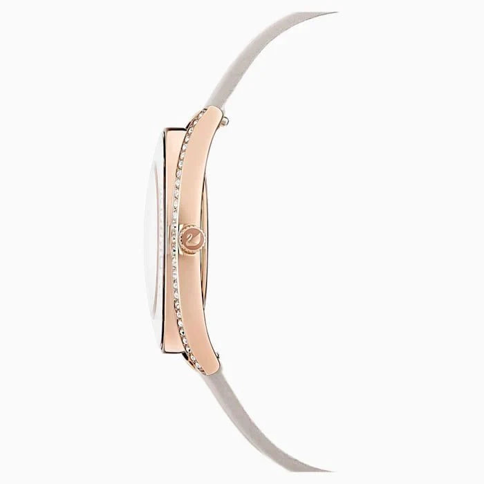 Side profile of Swarovski Crystalline Aura watch showing rose gold case and grey leather strap