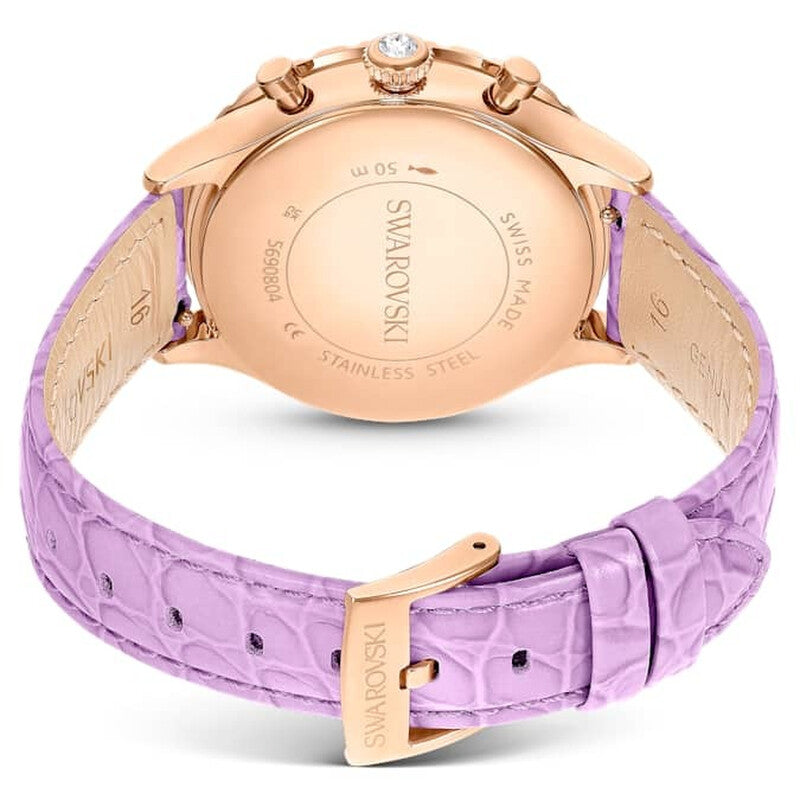 Rose gold stainless steel caseback of Swarovski Crystalline Aura watch with engraved text