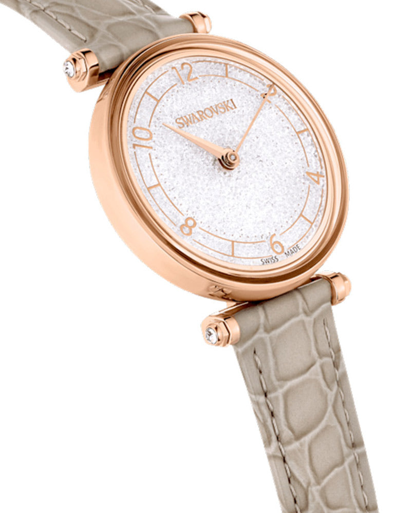 Angled front view of Swarovski Crystalline Wonder watch with crystal-filled dial and rose gold case