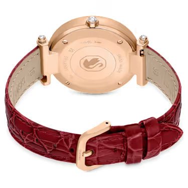 Caseback of Swarovski Crystalline Wonder watch showing rose-gold case and red crocodile leather strap