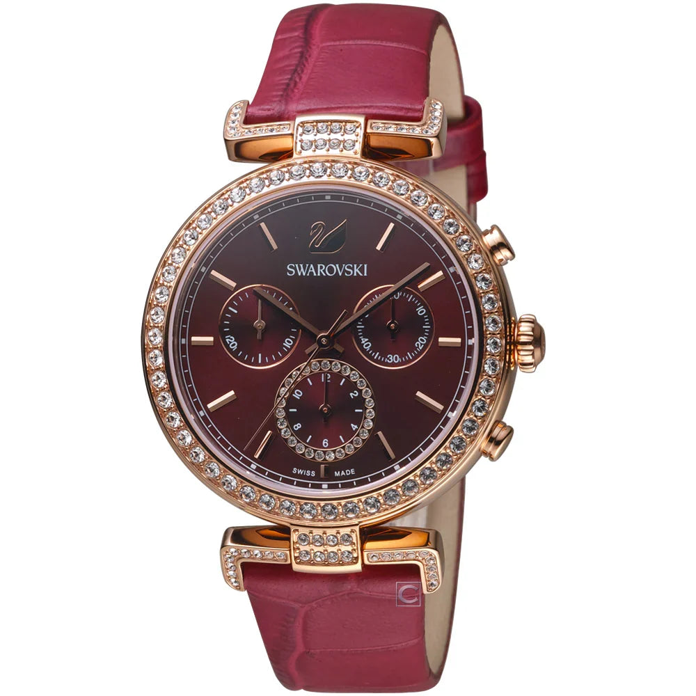 Angled view of Swarovski Era Journey watch displaying red dial, triple subdials, and crystal bezel