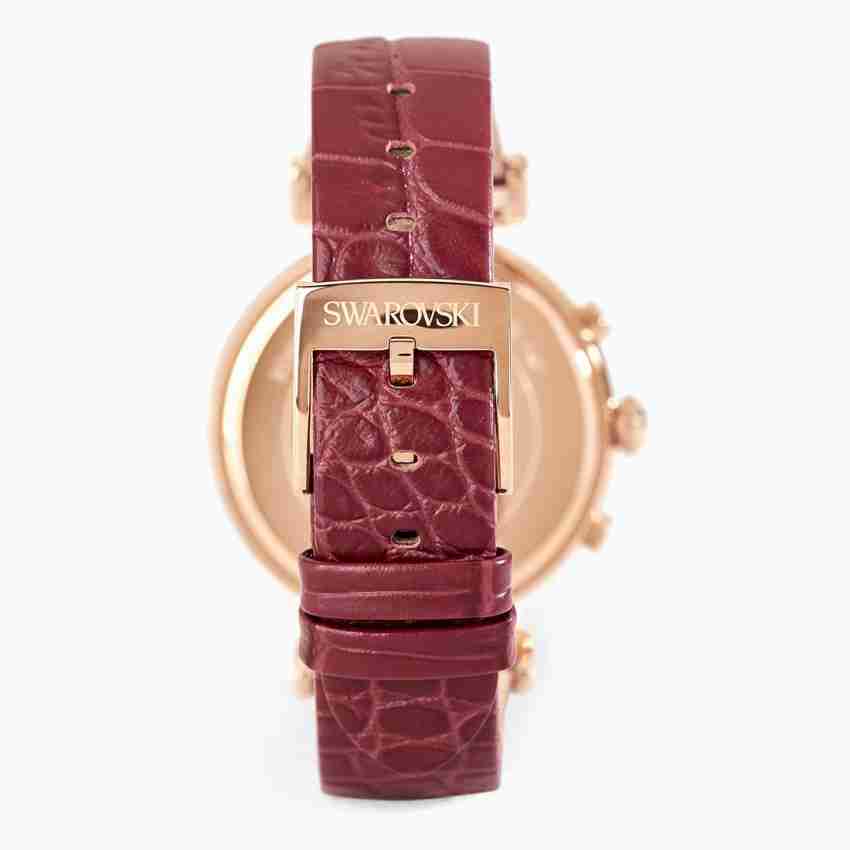 Caseback view of Swarovski Era Journey chronograph watch with rose gold case and red leather strap