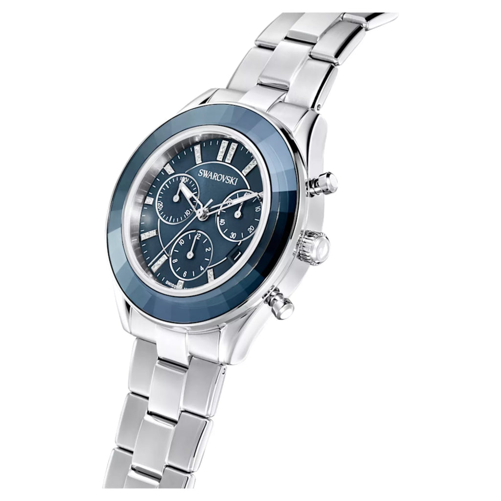 Side profile of Swarovski Octea Lux Sport watch displaying silver steel bracelet and blue bezel