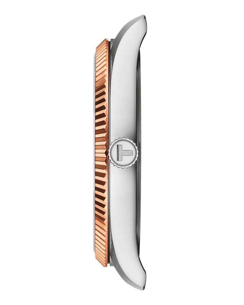 Side profile of Tissot Ballade showing rose gold PVD bezel and steel case