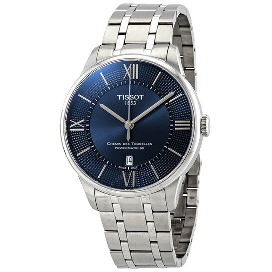 Tissot Chemin Des Tourelles watch at angle showing blue dial and stainless steel bracelet