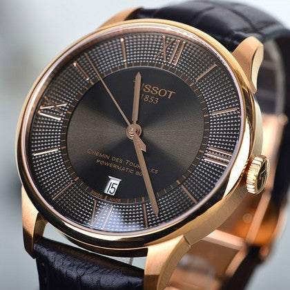 Tissot Chemin des Tourelles dial detail with roman numerals and date window