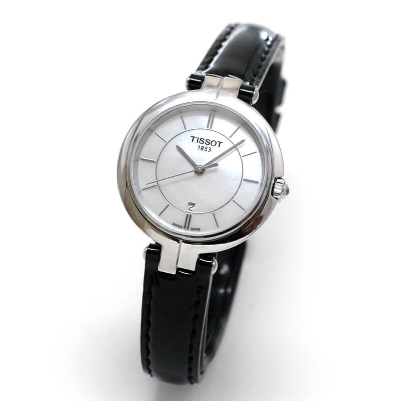 Tissot Flamingo watch on wrist with mother-of-pearl dial and black strap