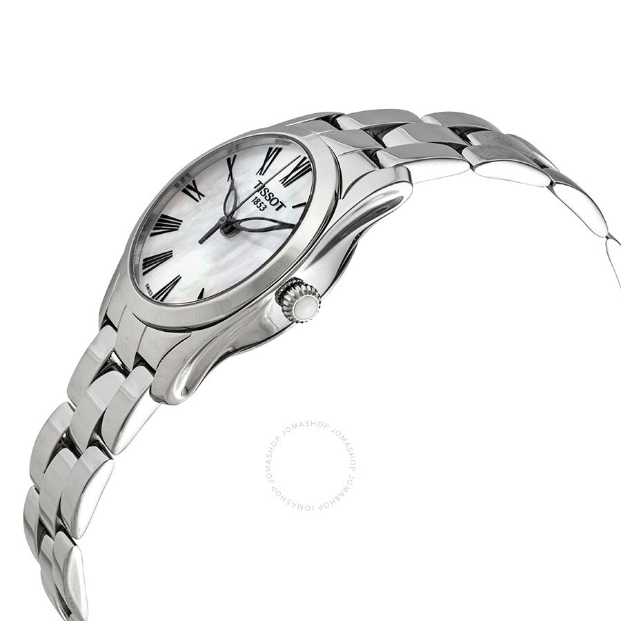 Tissot T-Wave ladies watch worn on wrist showing white dial with Roman numerals and stainless steel case