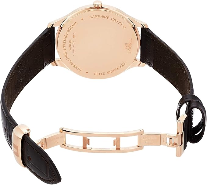 Tissot Tradition 5.5 watch caseback showing sapphire crystal and engravings