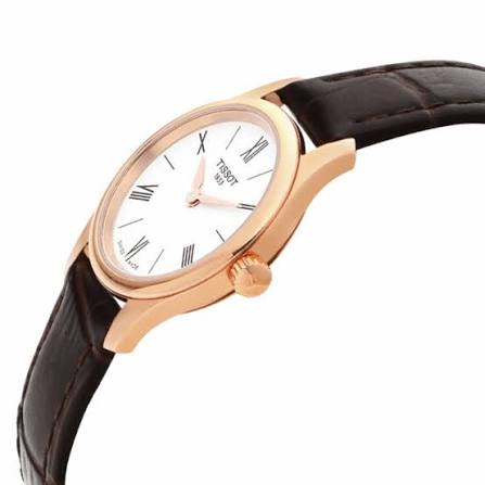 Side angle view of Tissot Tradition women's watch on wrist