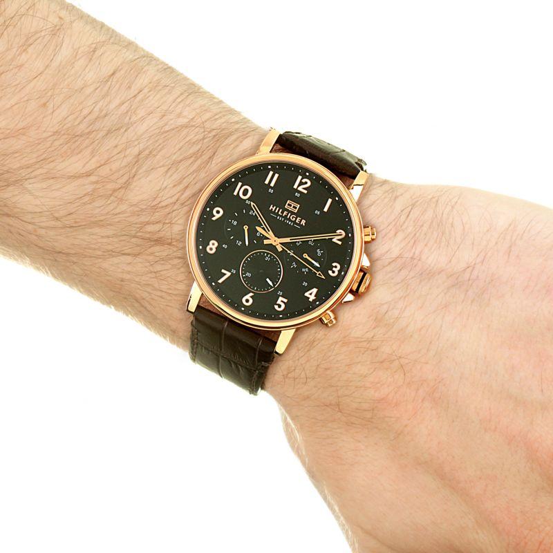 Tommy Hilfiger multi-function watch worn on wrist with brown leather strap
