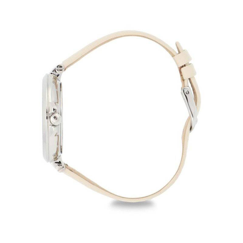 Tommy Hilfiger women's watch side view showing steel case and cream leather band