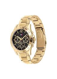 Side angle view of Tommy Hilfiger women's gold chronograph watch with black dial