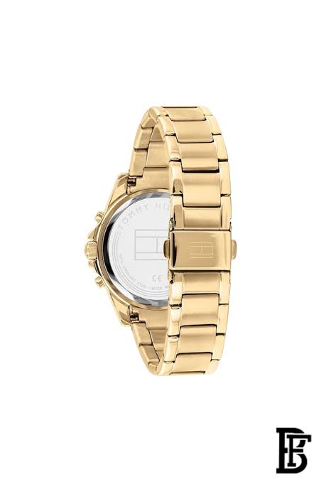 Caseback view of Tommy Hilfiger watch showing gold-tone case and bracelet