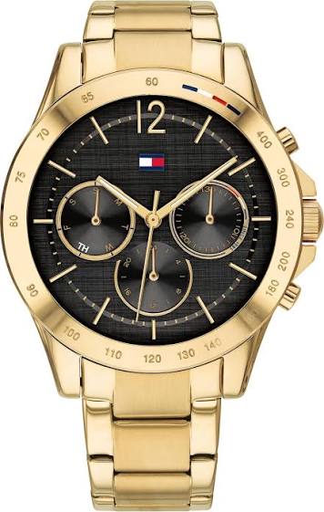 Tommy Hilfiger women's chronograph watch with gold-tone case, black dial, three subdials, and matching bracelet