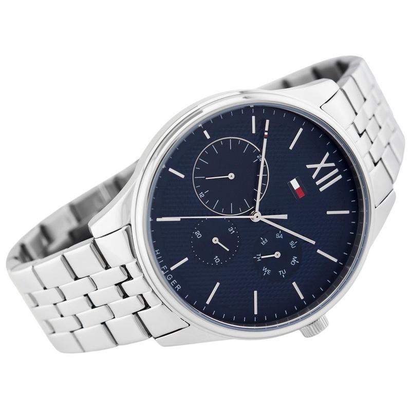 Tommy Hilfiger watch angled view showing blue dial and silver metal bracelet