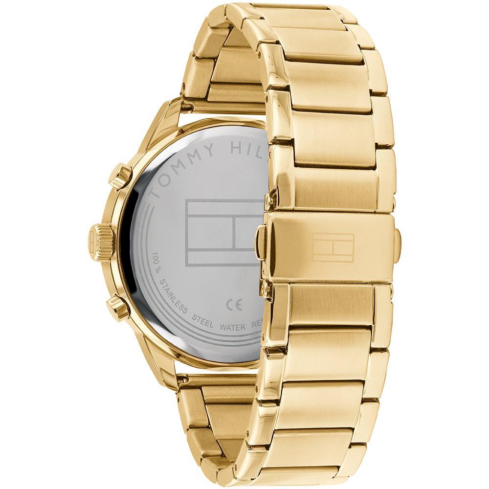 Golden Tommy Hilfiger watch caseback showing stainless steel construction and water resistance