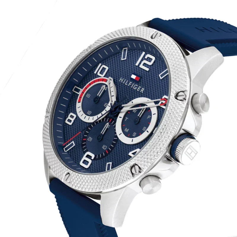 Side angle view of Tommy Hilfiger chronograph watch showing white case profile and blue silicone strap