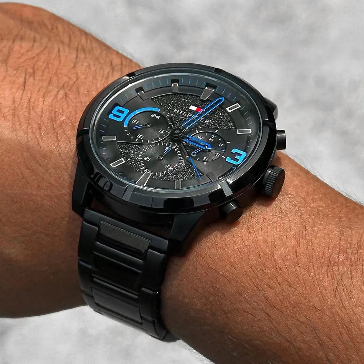 Tommy Hilfiger TH Bold black chronograph watch worn on wrist