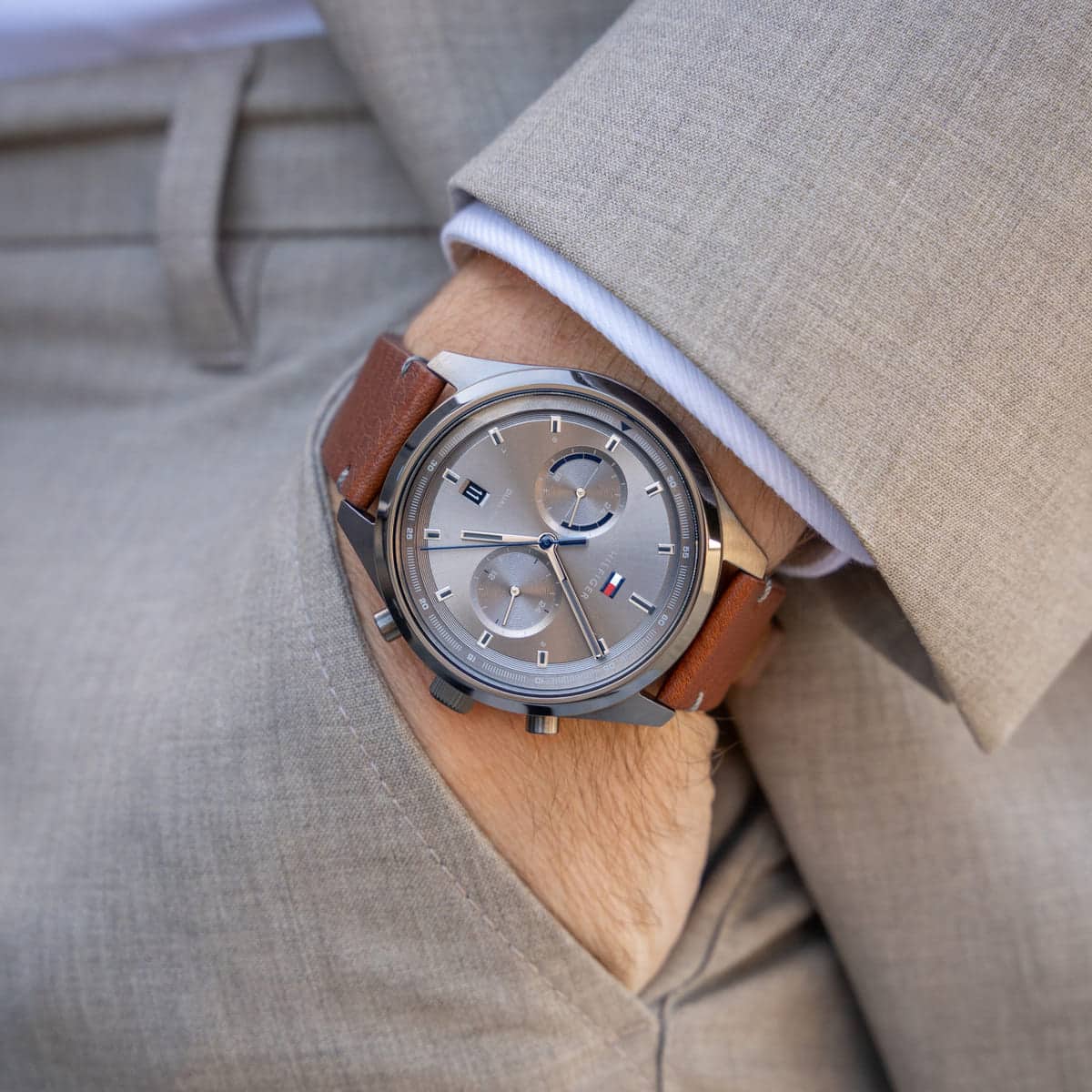 Tommy Hilfiger Bennett chronograph watch on wrist with grey sunburst dial