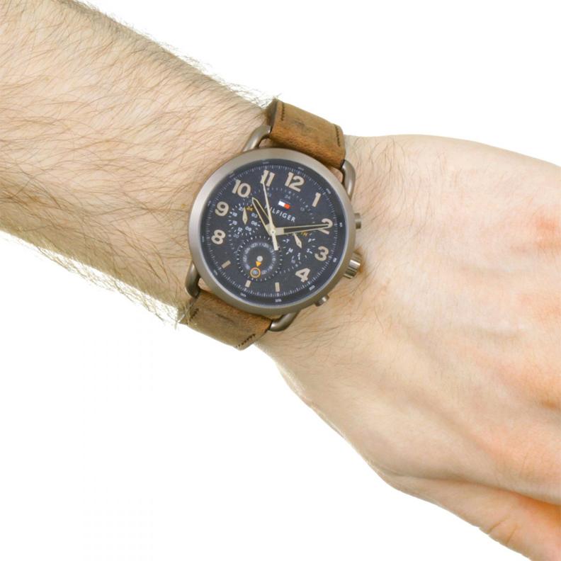 Tommy Hilfiger Briggs chronograph watch worn on wrist with tan leather strap