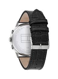 Tommy Hilfiger Chase watch displayed on side profile showing stainless steel case and black embossed leather strap