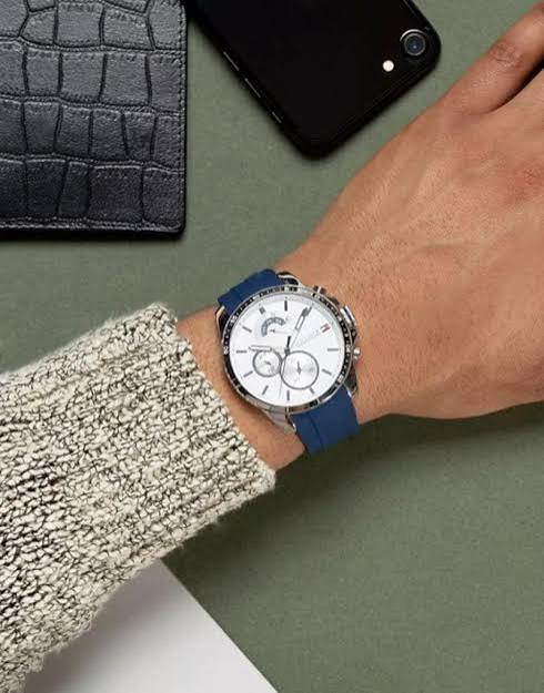 Tommy Hilfiger Cool Sport men's watch worn on wrist with blue strap