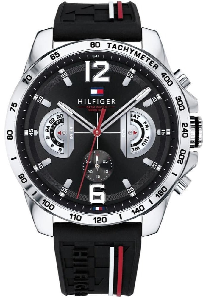 Tommy Hilfiger Decker men's chronograph watch with black dial, silver case, and black rubber strap