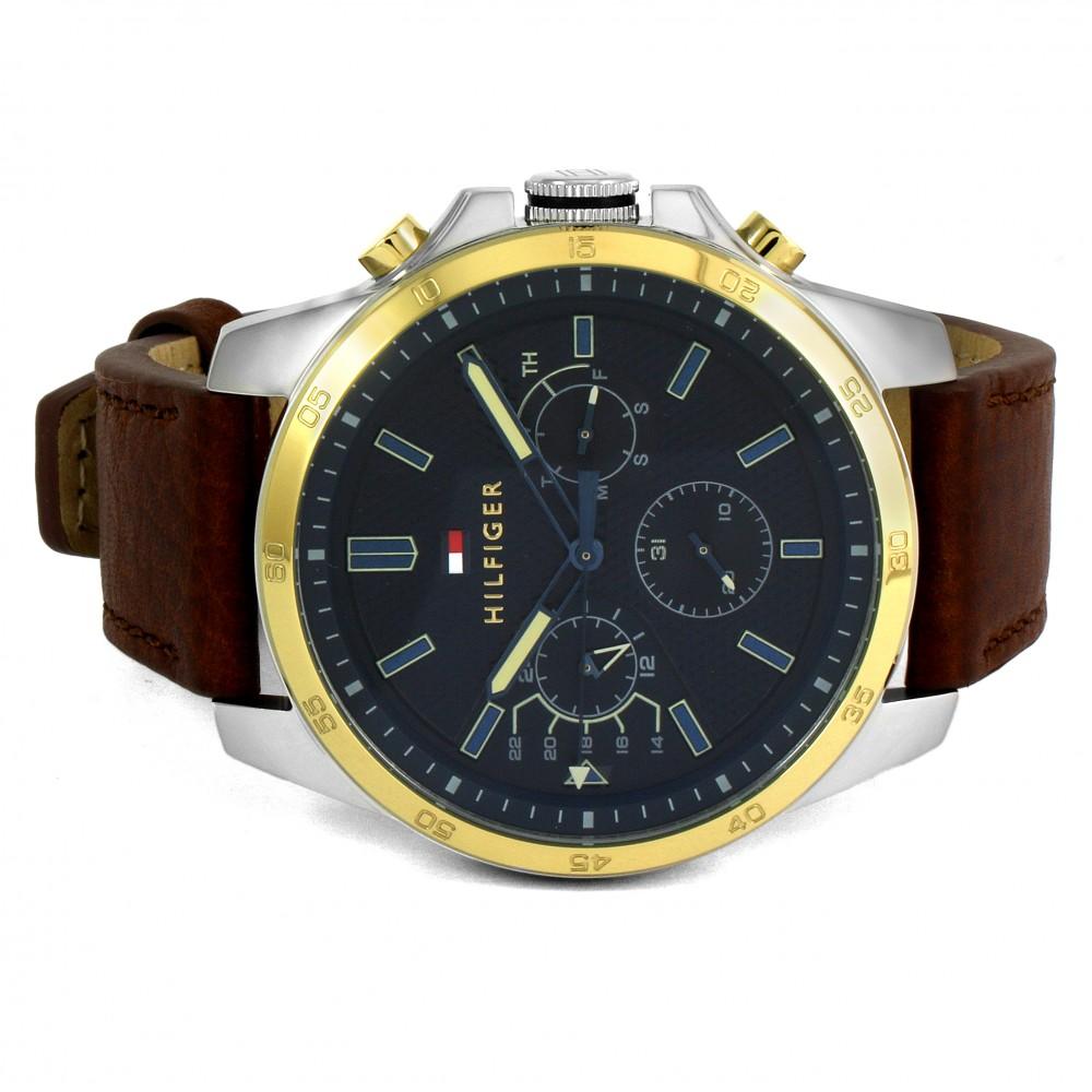 Side view of Tommy Hilfiger Decker watch displaying full case profile and brown strap