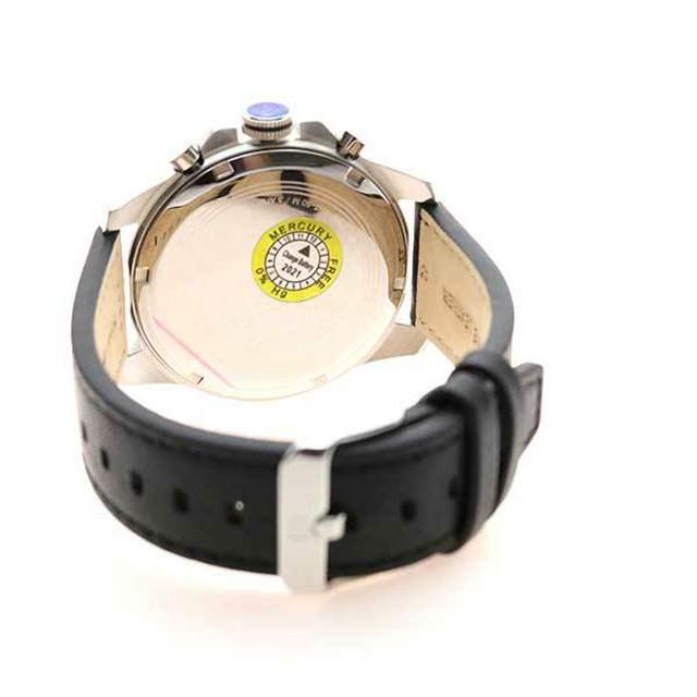Tommy Hilfiger Decker watch caseback with yellow warranty seal and black leather strap