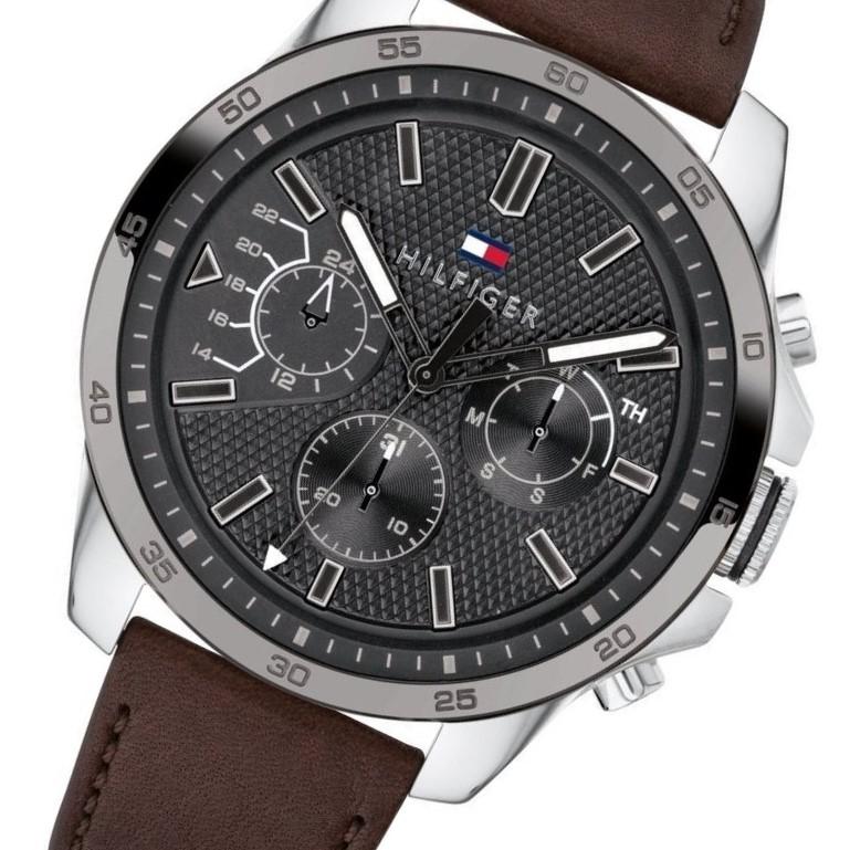 Angled view of Tommy Hilfiger Iconic chronograph with visible subdials and brown leather band