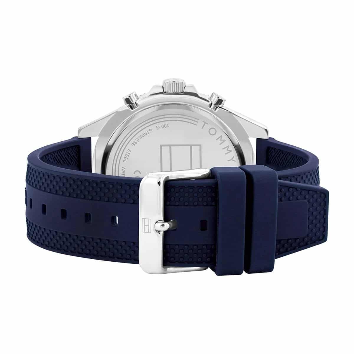 Tommy Hilfiger Larson watch caseback showing stainless steel back with blue rubber strap