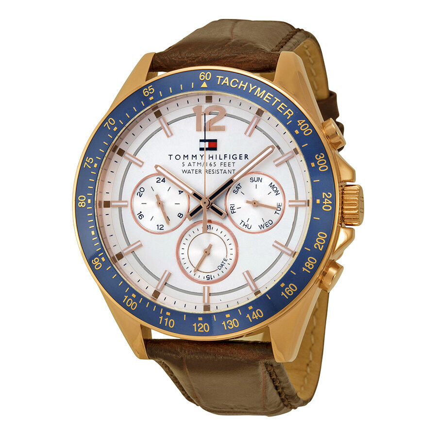 Tommy Hilfiger Luke chronograph watch with white dial, blue tachymeter bezel, and brown leather strap